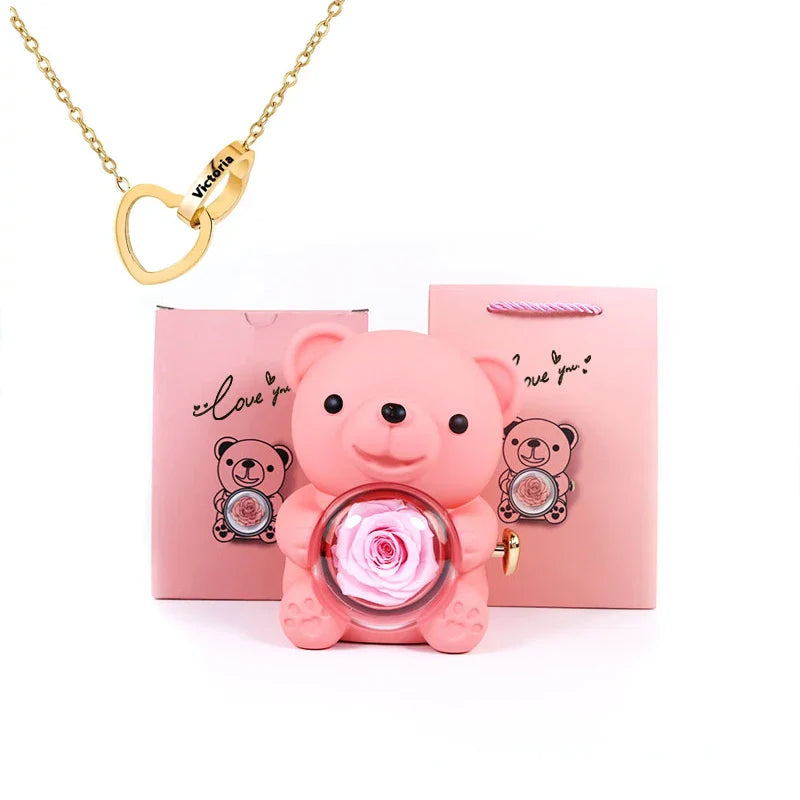 Urso Rotativo com Colar Dois Corações