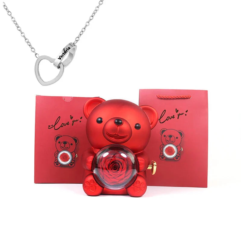 Urso Rotativo com Colar Dois Corações